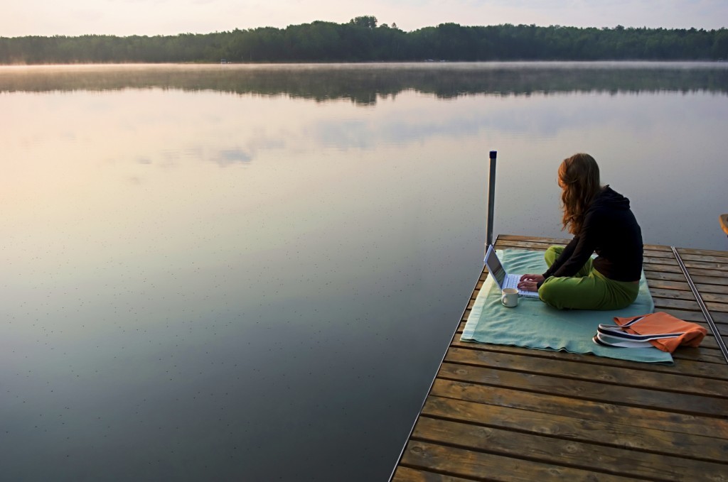 Travelancing Girl on Dock by Lake